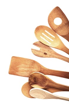 Traditional rustic wooden utensils isolated on white background