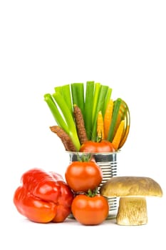 Various vegetables,a porcini mushroom and sausages before and in a tin