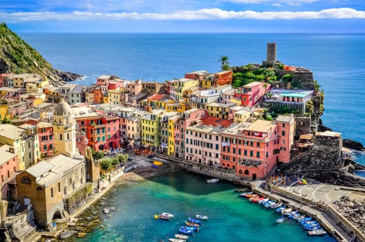 Scenic view of ocean and harbor in colorful village Vernazza, Cinque Terre, Italy