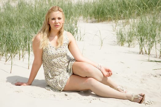 Young woman in the dunes
