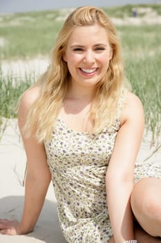 Young woman in the dunes