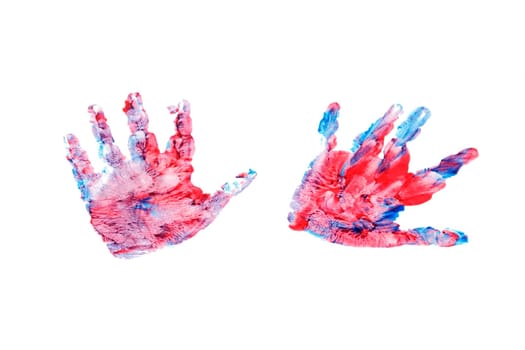 Colourful child's paint handprints on a white background