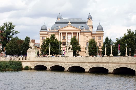 Schwerin,Germany – August 11,2013: The Schwerin Castle Bridge with a view of the Schwerin State Theatre on August 11,2013 in Schwerin.