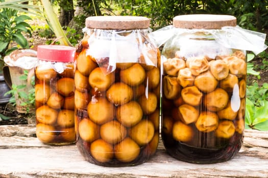 Pickled lemon in a glass jar