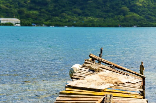 Old pier extending out into the Caribbean in San Andres y Providencia, Colombia
