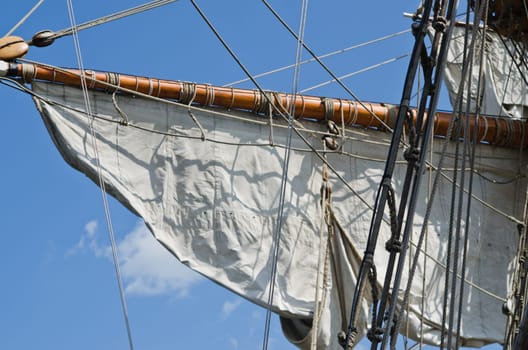 Mast with sails of an old sailing vessel