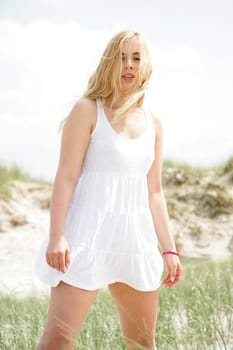 Young woman by the sea