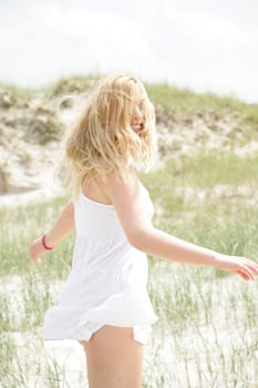 Young woman by the sea