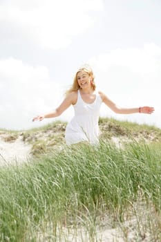 Young woman by the sea