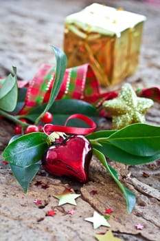 Decoration in red and gold for Christmas on fir branches