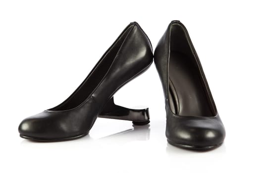 Elegant high heel shoes on white background. Black footwear.