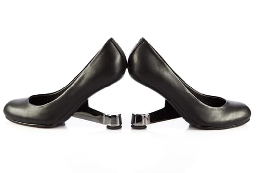 Elegant high heel shoes on white background. Black footwear.
