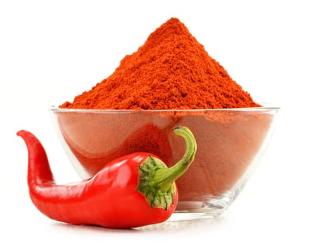 Glass bowl with red hot chili pepper isolated on white