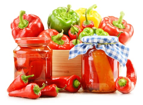 Composition with assorted peppers isolated on white background