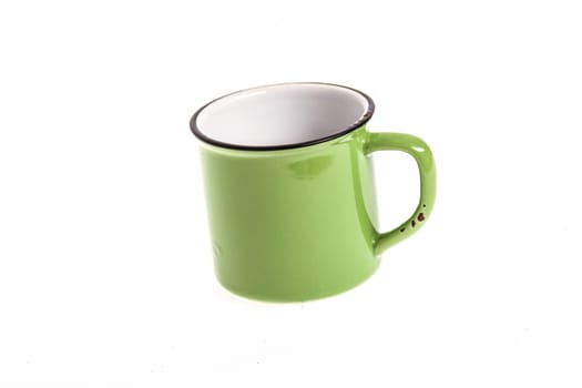 A green broken-down cup, empty, isolated.