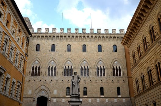The monument of Sallustio Bandini on Square Salimbeni in Siena, Tuscany in Italy