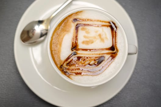 coffee with drawing in the form of computer