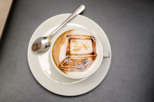 coffee with drawing in the form of computer