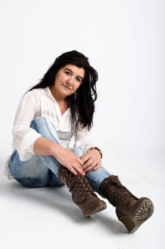 senior woman smiling over a white background