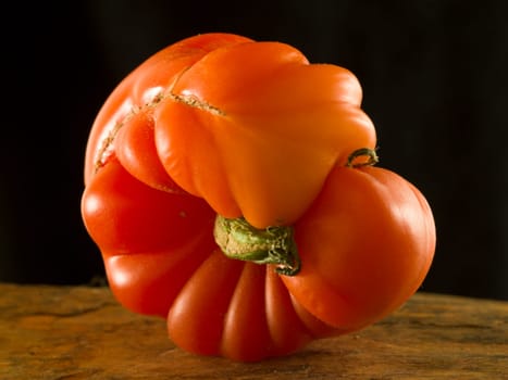 a strange tomato in an artistic way