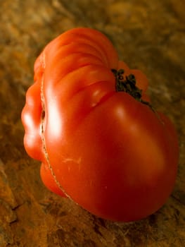 a strange tomato in an artistic way