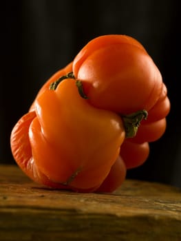 a strange tomato in an artistic way