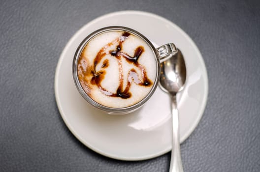 coffee with drawing in the shape of fish