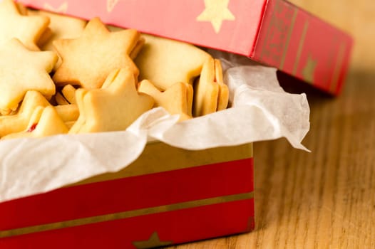 Christmas cookies star in red decoration box Xmas tin