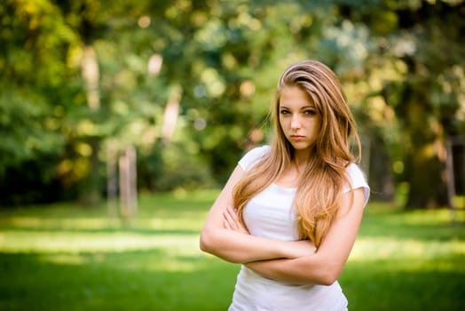 Portrait of cheeky teen girl - outdoor in nature