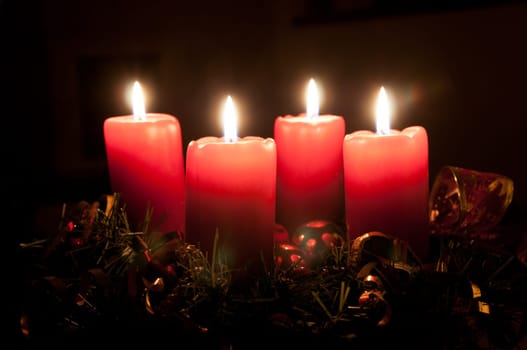 Christmas advent wreath with burning candles