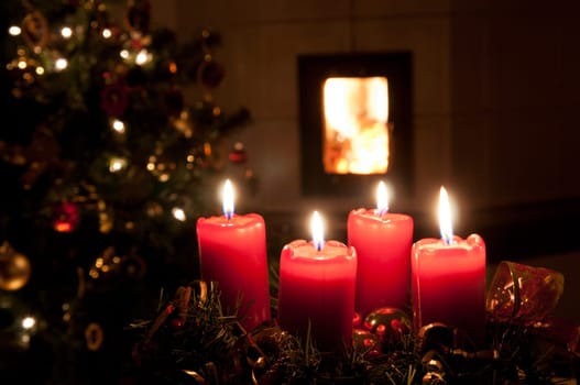 Christmas advent wreath with burning candles
