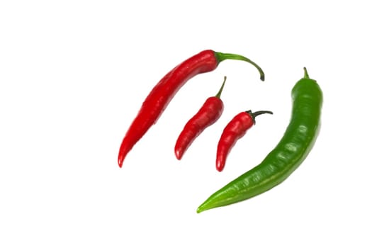 Group of green and red chilly peppers. Isolated.