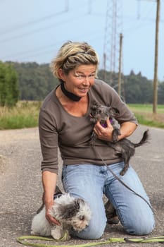 Woman with puppies
