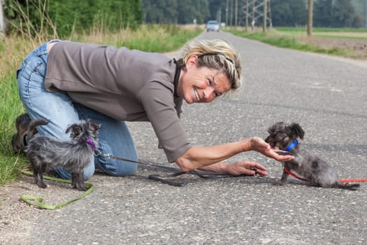 Woman with puppies