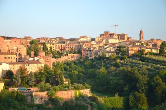 Gorgeous panorama of Siena at sunset in the summertime, Tuscany, Italy
