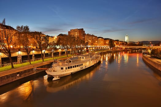 Vienna by night,Danube Canal by boat at Schwedenplatz