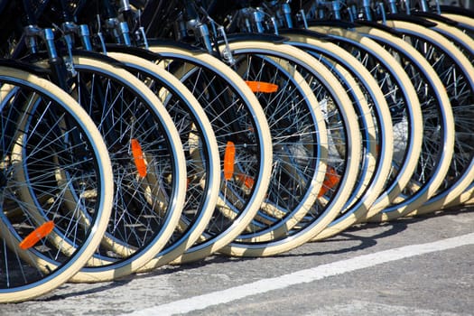 Bicycles front wheel tyres in a row detail