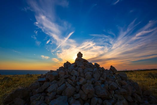 Barbaria Berberia Cape stone mountain in Formentera at sunset at Balearic Islands