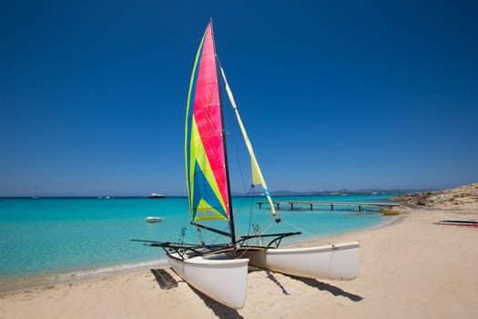 Catamaran sailboat in Illetes beach of Formentera at Balearic Islands