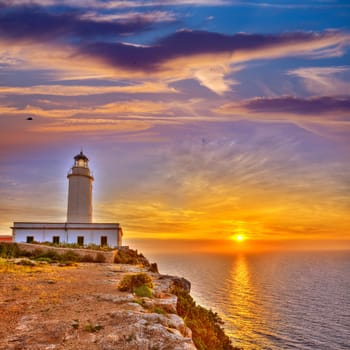 La Mola Cape Lighthouse Formentera at sunrise in Balearic Islands