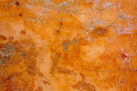 Ibiza grunge orange facade texture cement background