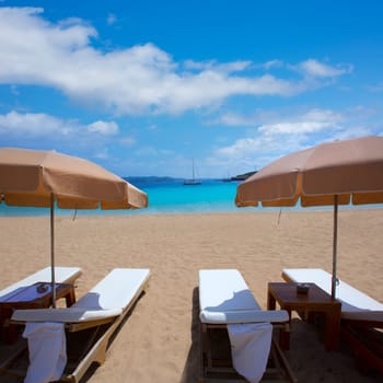 Ibiza Cala Bassa beach with turquoise Mediterranean sea at Balearic Islands