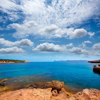 Ibiza Cala Bassa beach with turquoise Mediterranean sea at Balearic Islands