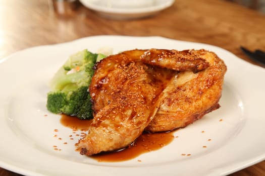 Roasted duck with sesame seeds and broccoli