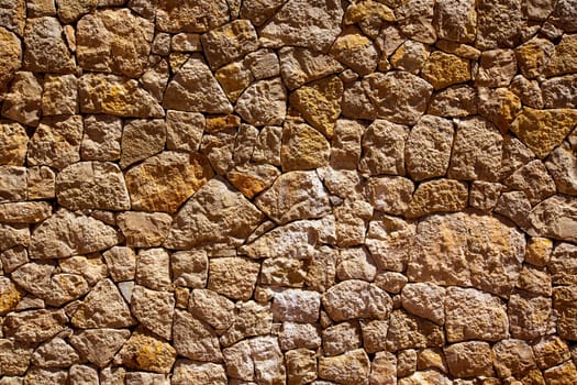 Ibiza masonry wall detail of mediterranean stonewall traditional construction texture
