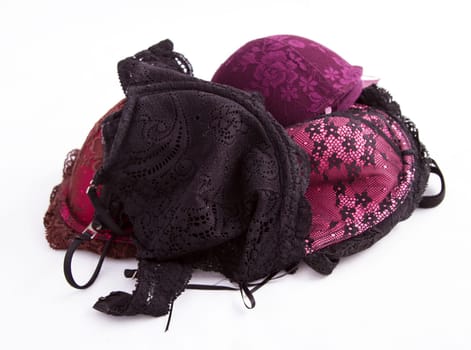 A pile of lace brassieres.