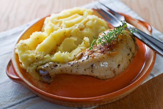Roasted chicken with mash potatoes close up