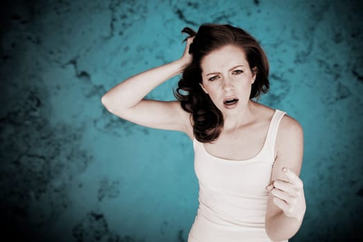 Young attractive woman making her emotions clear that she is angry.