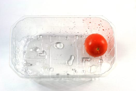 Tomato in transparent packaging