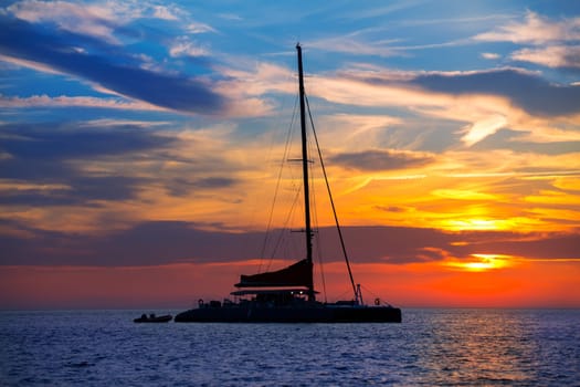 Ibiza san Antonio Abad de Portmany catamaran sailboat sunset with in Balearic islands of spain